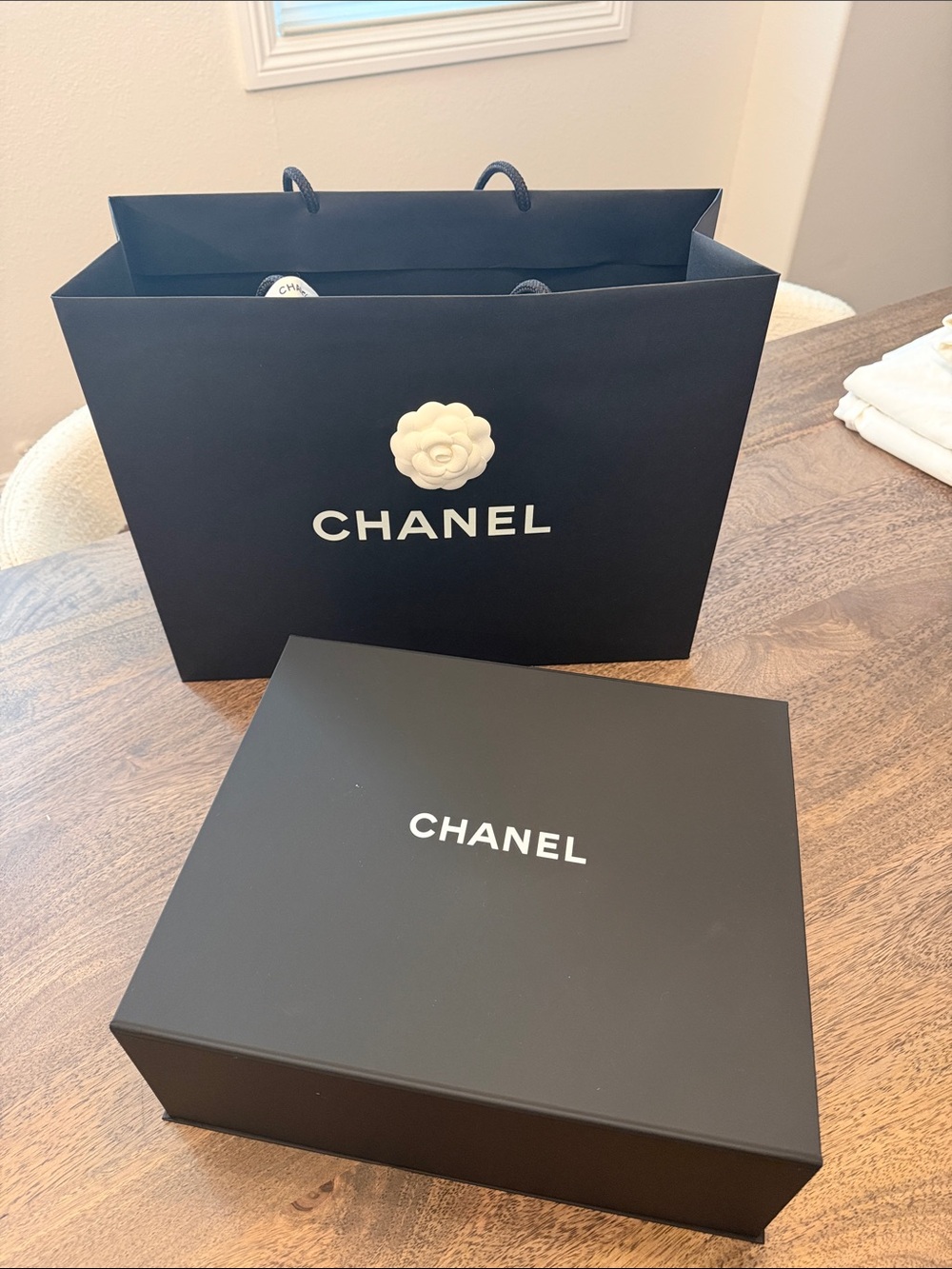 Chanel box and shopping bag